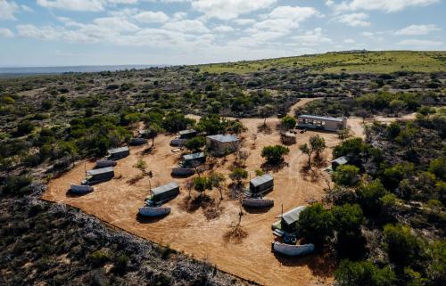 an aerial view of a farm with houses and trees at Peace Haven @ Windfarm Accommodation in Yzerfontein