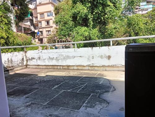a view of a stone walkway with a fence at Ronglyang Lotus Villa in Tādong