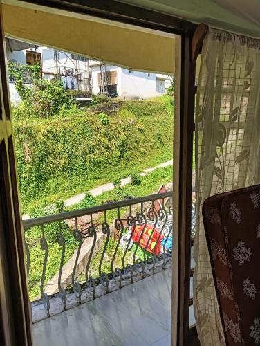 a view from a window of a balcony at Ronglyang Lotus Villa in Tādong