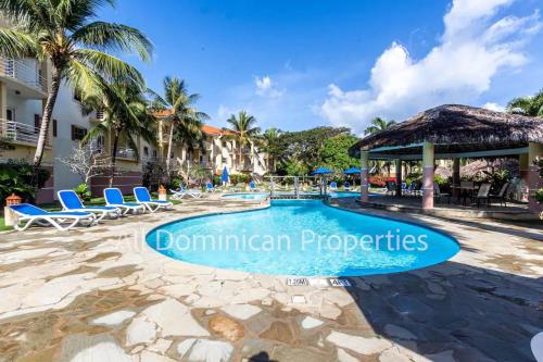 a swimming pool at the dominican resort at Ocean Dream Studios, kiters paradise! in Cabarete