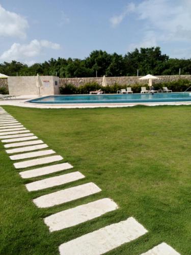 Swimmingpoolen hos eller tæt på Crisfer Punta Cana