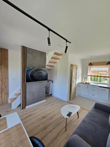 Una cocina o zona de cocina en Sunrise Marina Domki Mielno- Ferienhaus