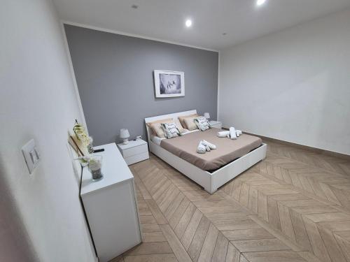 Giường trong phòng chung tại Sweet Home Airport