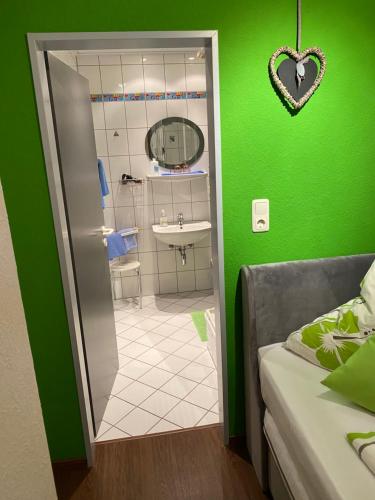 Ένα μπάνιο στο Ferienwohnung Rockenbach