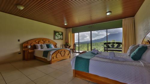 Ένα ή περισσότερα κρεβάτια σε δωμάτιο στο Hotel Linda Vista