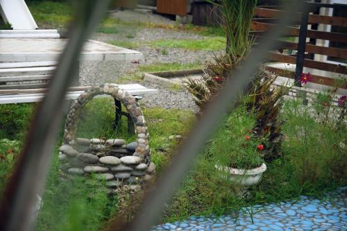 Ein Garten an der Unterkunft Magnito