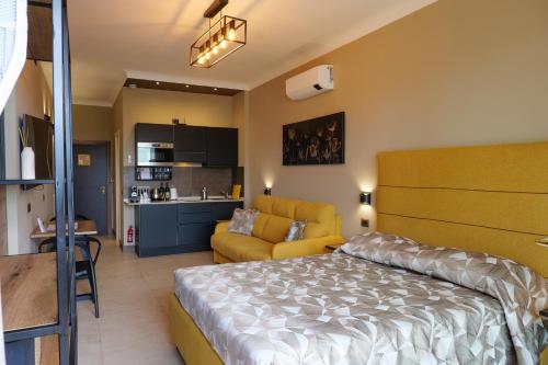 a bedroom with a bed and a living room at Domus Aurelia in Rome