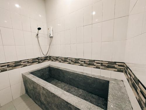 Ένα μπάνιο στο Tuscany Hotel Buriram