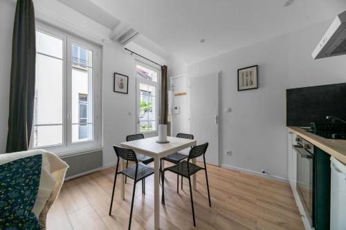 Televízia a/alebo spoločenská miestnosť v ubytovaní Residence Le Languedoc - Appartements design - Proche des parcs