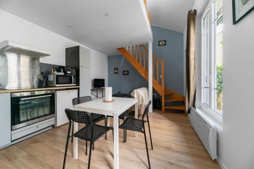 Kuchyňa alebo kuchynka v ubytovaní Residence Le Languedoc - Appartements design - Proche des parcs