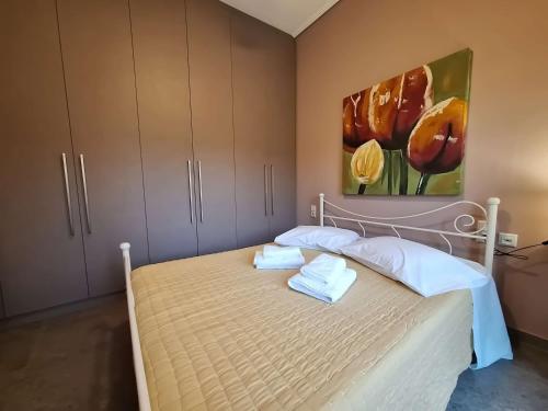 Letto o letti in una camera di Volos Pelion View