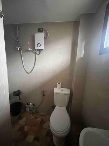 Koupelna v ubytování Studio apartment in Mactan, Cebu Rm 202