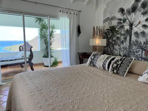 Ένα ή περισσότερα κρεβάτια σε δωμάτιο στο Luxurious 7-Bedroom Villa with magnificent view