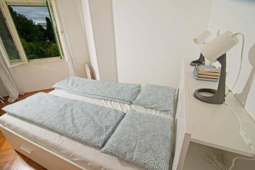 Postel nebo postele na pokoji v ubytování Apartment SVEN Opatija