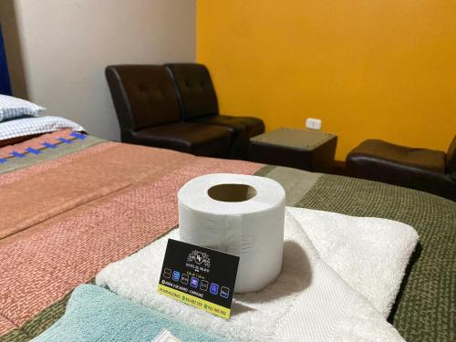 Ένα ή περισσότερα κρεβάτια σε δωμάτιο στο Hotel EL BRAVO