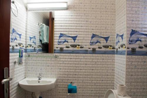 Koupelna v ubytování Kenendia Hotel