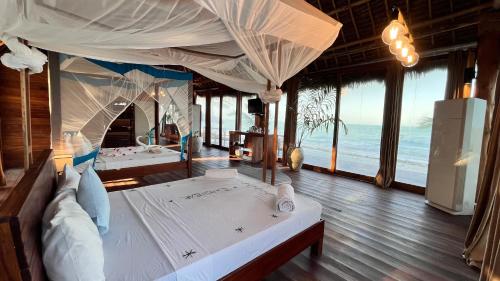 Voodi või voodid majutusasutuse TIKI Beach Club & Resort toas