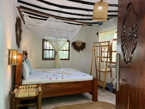 Voodi või voodid majutusasutuse TIKI Beach Club & Resort toas