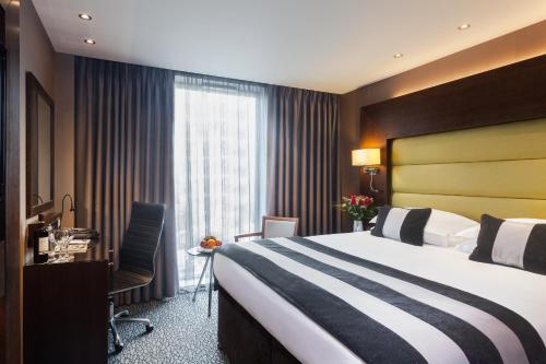 Katil atau katil-katil dalam bilik di Park Grand Heathrow
