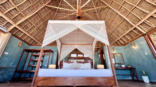 Voodi või voodid majutusasutuse TIKI Beach Club & Resort toas
