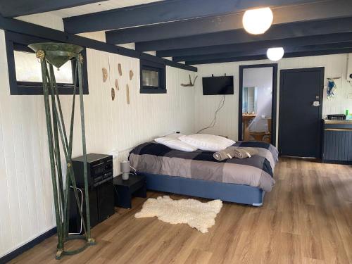 Una cama o camas en una habitación de Hostel Cala 816