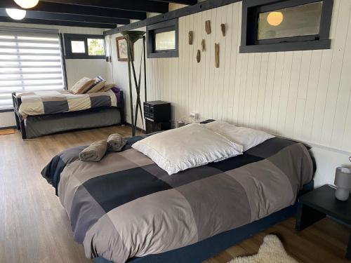 Una cama o camas en una habitación de Hostel Cala 816