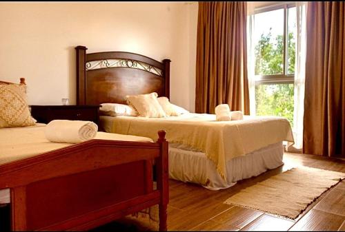 Cama ou camas em um quarto em Habitaciones con amplia terraza a minutos del centro