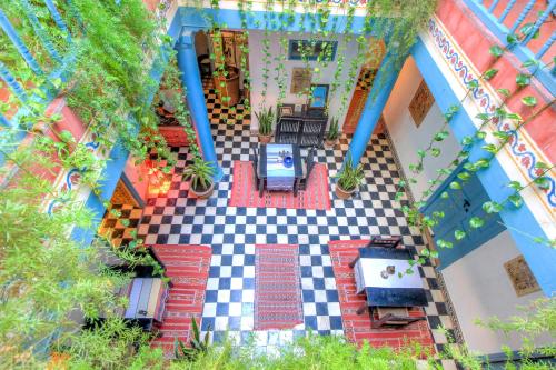 an overhead view of a house with a checkered floor at Les Matins Bleus in Essaouira