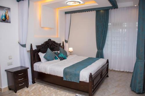 Postel nebo postele na pokoji v ubytování ORANA Luxury Palace