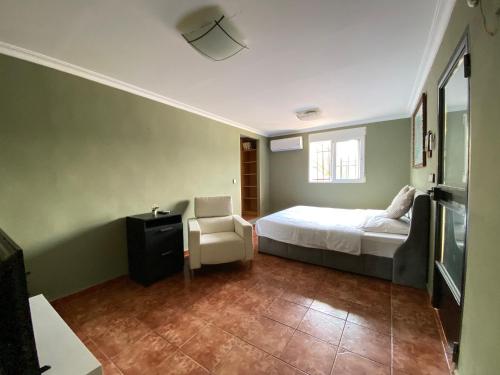 Ένα ή περισσότερα κρεβάτια σε δωμάτιο στο Guesthouse in Torrent