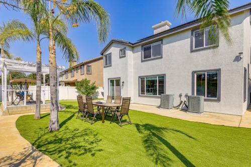 a house with a table and chairs in a yard at Mtn-View Gem with Private Yard Luxe Beaumont Home in Beaumont