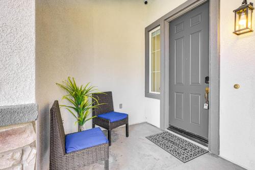 a porch with a door and chairs and a plant at Mtn-View Gem with Private Yard Luxe Beaumont Home in Beaumont