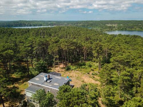 an aerial view of a house in the woods at National Seashore w Modern Architecture in Wellfleet