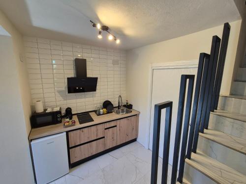 Kuchyň nebo kuchyňský kout v ubytování Grupo García de Paredes apartamentos turísticos