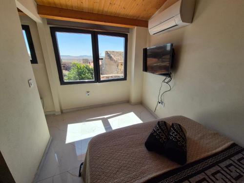 TV a/nebo společenská místnost v ubytování Grupo García de Paredes apartamentos turísticos