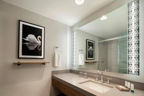 a bathroom with a sink and a large mirror at The Westin Copley Place, Boston in Boston