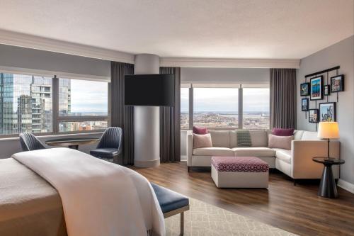 a bedroom with a bed and a living room at The Westin Copley Place, Boston in Boston