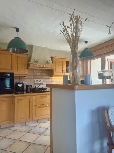 Una cocina o zona de cocina en Chalet les vergers