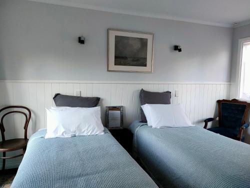 Una cama o camas en una habitación de Burnside Homestead