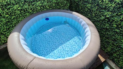 an inflatable swimming pool in a water park at Sous le Grand Pin Piscine & Spa Gîtes Éden en Cévennes à Anduze Gard in Anduze