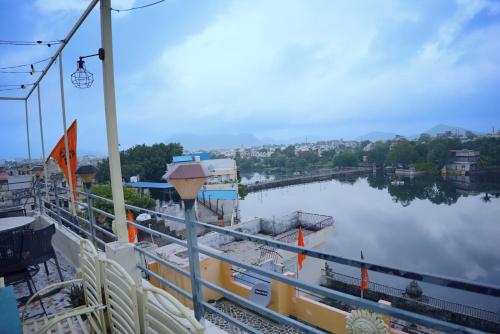 a view of a river from a cruise ship at Whereabout Hostel Udaipur in Udaipur