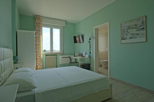 Postel nebo postele na pokoji v ubytování Alla Scaletta - Stanze con Bagno Privato e WiFi a Pochi Passi dal Duomo
