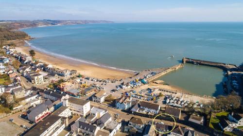 an aerial view of a city and a beach at Harbour Reach - 2 storey apartment in Saundersfoot in Saundersfoot