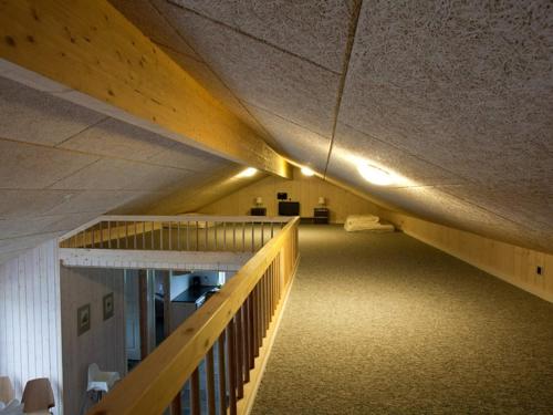 a hallway with a staircase in a building at Luxury Retreat by Fjord - By Traum Ferienwohnungen in Tarm