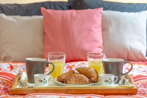 Ένα ή περισσότερα κρεβάτια σε δωμάτιο στο A due passi dal centro 2 camere matrimoniali Wifi