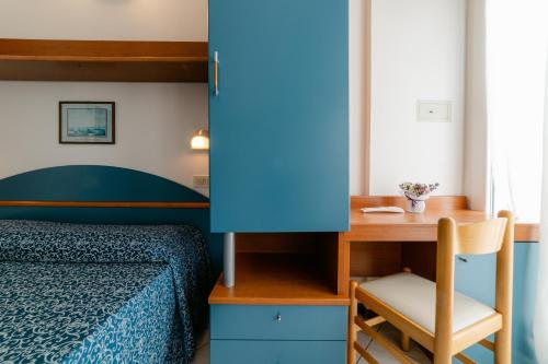 Postel nebo postele na pokoji v ubytování Hotel Golf