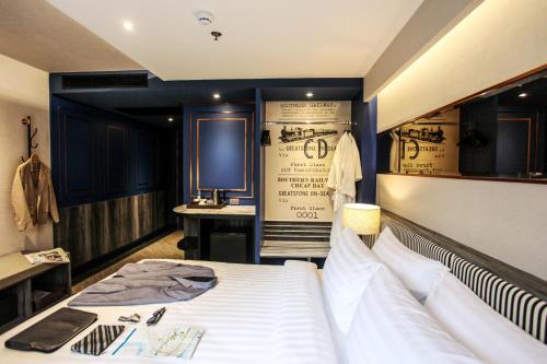 Katil atau katil-katil dalam bilik di Vince Hotel Pratunam