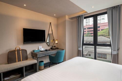 Katil atau katil-katil dalam bilik di Vince Hotel Pratunam