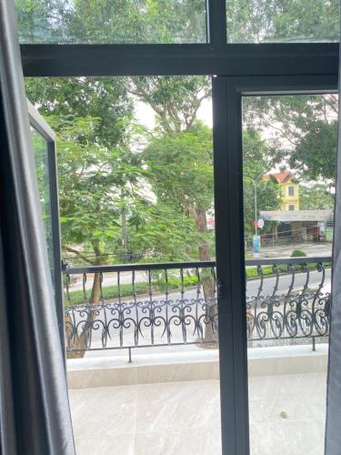 a view of a balcony from a window at Tamcoc Motel in Văn Lâm