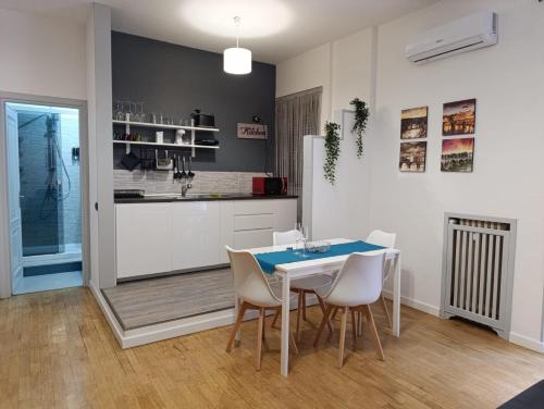 Kuchyň nebo kuchyňský kout v ubytování Oasi Del Vaticano